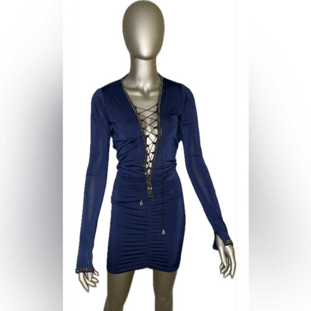 Backless mini party dress decorated with the stones . Perfect for any event